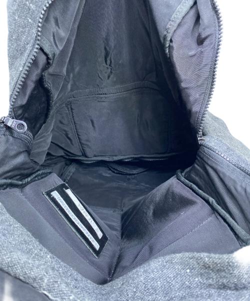 JOHN LAWRENCE SULLIVAN（ジョン ローレンス サリバン）JOHN LAWRENCE SULLIVAN (ジョン ローレンス サリバン) リュック グレーの古着・服飾アイテム