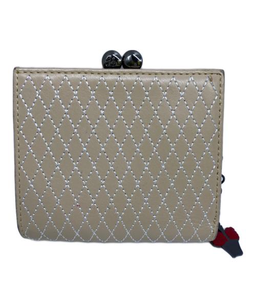 LULU GUINNESS（ルルギネス）LULU GUINNESS (ルルギネス) 2つ折り財布 ベージュの古着・服飾アイテム