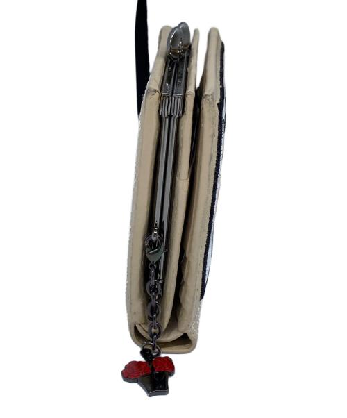 LULU GUINNESS（ルルギネス）LULU GUINNESS (ルルギネス) 2つ折り財布 ベージュの古着・服飾アイテム
