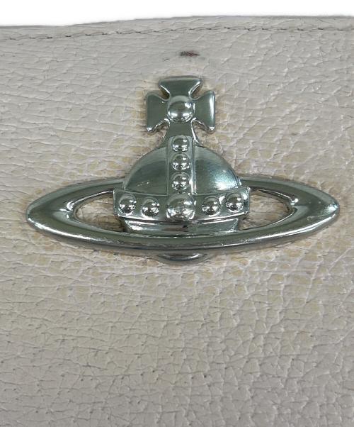 Vivienne Westwood（ヴィヴィアンウエストウッド）Vivienne Westwood (ヴィヴィアンウエストウッド) 口金2つ折りミニ財布 ピンクの古着・服飾アイテム