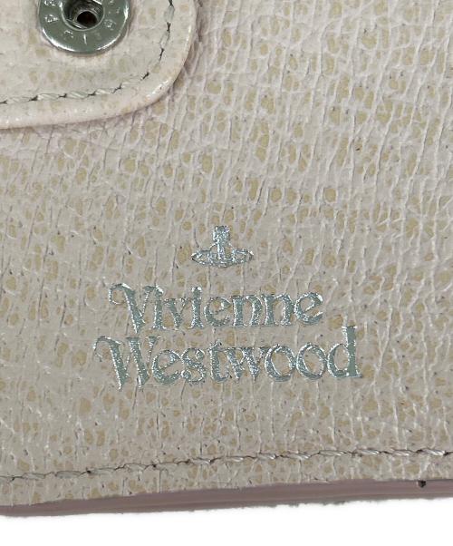 Vivienne Westwood（ヴィヴィアンウエストウッド）Vivienne Westwood (ヴィヴィアンウエストウッド) 口金2つ折りミニ財布 ピンクの古着・服飾アイテム