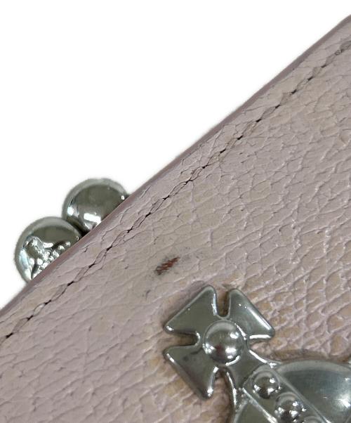 Vivienne Westwood（ヴィヴィアンウエストウッド）Vivienne Westwood (ヴィヴィアンウエストウッド) 口金2つ折りミニ財布 ピンクの古着・服飾アイテム