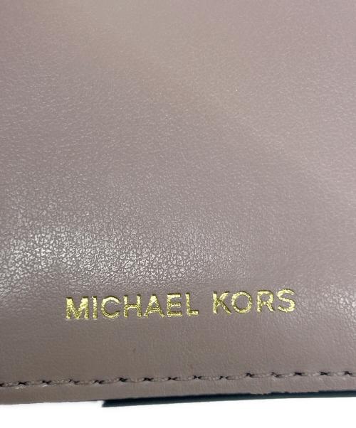 MICHAEL KORS（マイケルコース）MICHAEL KORS (マイケルコース) ポシェット ピンク×アイボリーの古着・服飾アイテム