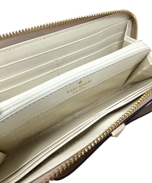 Kate Spade（ケイトスペード）Kate Spade (ケイトスペード) L字ファスナー長財布　Kate Spade(ケイト・スペード)　PWRU3567 ベージュの古着・服飾アイテム