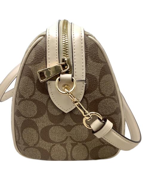 COACH（コーチ）COACH (コーチ) 2WAYバッグ　COACH（コーチ）CH486　ローアン サッチェル・ブロックド シグネチャー ベージュの古着・服飾アイテム