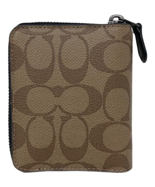 COACH（コーチ）COACH (コーチ) Disney (ディズニー) 2つ折り財布　COACH（コーチ）　Disney（ディズニー）　91658　とんすけ ベージュの古着・服飾アイテム