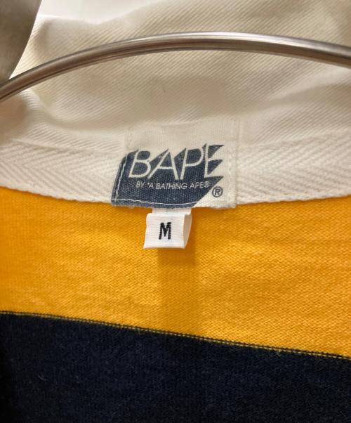 BAPE BY A BATHING APE（ベイプバイアベイシングエイプ）BAPE BY A BATHING APE (ベイプバイアベイシングエイプ) ラガーシャツ イエロー サイズ:SIZE Mの古着・服飾アイテム