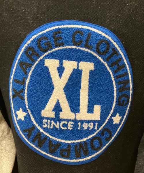 X-LARGE（エクストララージ）X-LARGE (エクストララージ) スタジャン ブラック×ホワイト サイズ:SIZE Mの古着・服飾アイテム