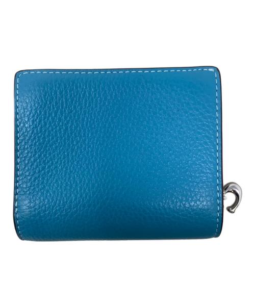 COACH（コーチ）COACH (コーチ) PEANUTS (ピーナッツ) スナップ ウォレット・ライナス スカイブルーの古着・服飾アイテム
