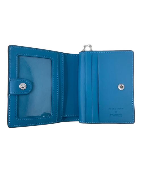 COACH（コーチ）COACH (コーチ) PEANUTS (ピーナッツ) スナップ ウォレット・ライナス スカイブルーの古着・服飾アイテム