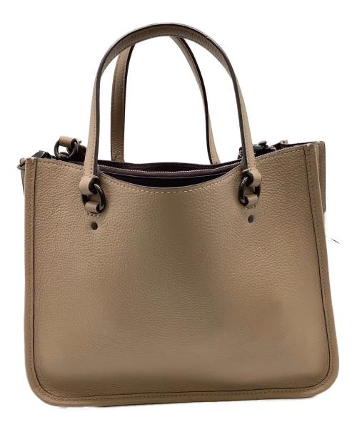 COACH（コーチ）COACH (コーチ) タイラー キャリーオール28 ベージュの古着・服飾アイテム