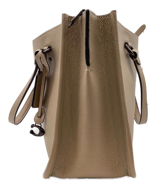 COACH（コーチ）COACH (コーチ) タイラー キャリーオール28 ベージュの古着・服飾アイテム