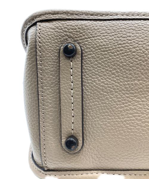 COACH（コーチ）COACH (コーチ) タイラー キャリーオール28 ベージュの古着・服飾アイテム