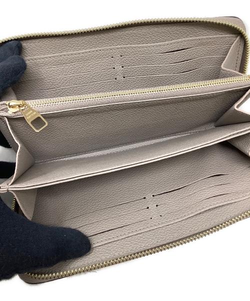 LOUIS VUITTON（ルイ ヴィトン）LOUIS VUITTON (ルイ ヴィトン) ラウンドファスナー ジッピー ウォレット モノグラム アンプラント トゥルトレール ベージュの古着・服飾アイテム