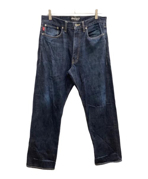stussy（ステューシー）stussy (ステューシー) ペイントロゴデニムパンツ インディゴ サイズ:SIZE 81cm (W32)の古着・服飾アイテム