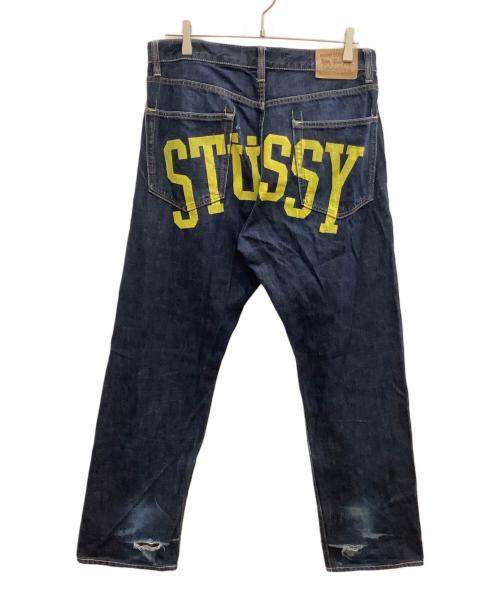 stussy（ステューシー）stussy (ステューシー) ペイントロゴデニムパンツ インディゴ サイズ:SIZE 81cm (W32)の古着・服飾アイテム