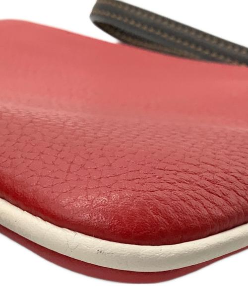 COACH（コーチ）COACH (コーチ) DISNEY (ディズニー) ポーチ　キースヘリング ポーチ リストレット　C1174 レッドの古着・服飾アイテム