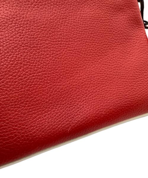 COACH（コーチ）COACH (コーチ) DISNEY (ディズニー) ポーチ　キースヘリング ポーチ リストレット　C1174 レッドの古着・服飾アイテム