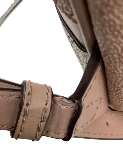 MICHAEL KORS（マイケルコース）MICHAEL KORS (マイケルコース) MKシグネチャー リュックサック デイバッグ ロゴ総柄　0S0GEZB2V ピンク×ホワイトの古着・服飾アイテム