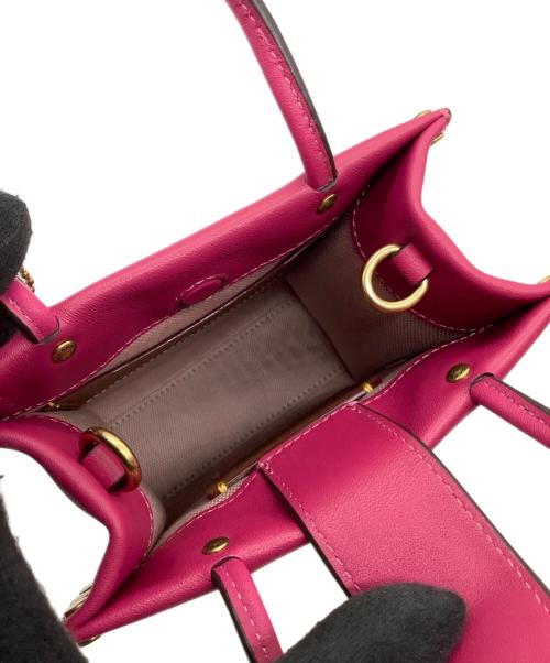 COACH（コーチ）COACH (コーチ) ミニカシントートークリスタルリベット　ce729 ピンクの古着・服飾アイテム