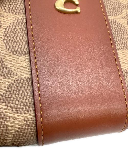 COACH（コーチ）COACH (コーチ) ビルフォールド ウォレット・カラーブロック シグネチャー キャンバス　2つ折り財布 ブラウンの古着・服飾アイテム