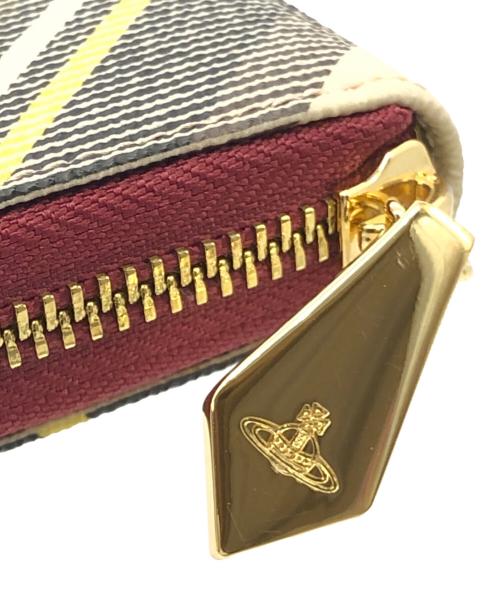 Vivienne Westwood（ヴィヴィアンウエストウッド）Vivienne Westwood (ヴィヴィアンウエストウッド) DERBY　ラウンドファスナー財布 ピンク×ブラックの古着・服飾アイテム