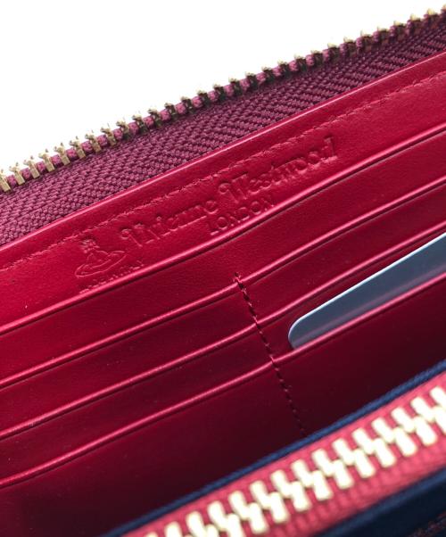 Vivienne Westwood（ヴィヴィアンウエストウッド）Vivienne Westwood (ヴィヴィアンウエストウッド) DERBY　ラウンドファスナー財布 ピンク×ブラックの古着・服飾アイテム