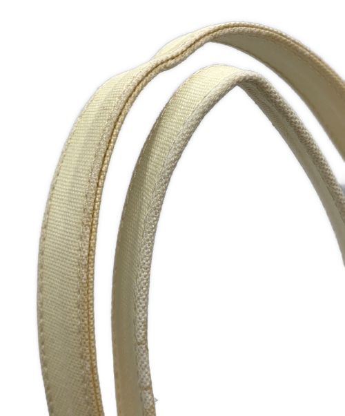 Acne studios（アクネ ストゥディオス）ACNE STUDIOS (アクネストゥディオス) キャンバスコーティングトートバッグ アイボリーの古着・服飾アイテム