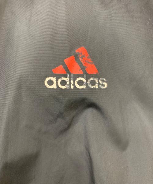 adidas（アディダス）adidas (アディダス) ウインドブレーカー レッド×ブラック サイズ:XLの古着・服飾アイテム