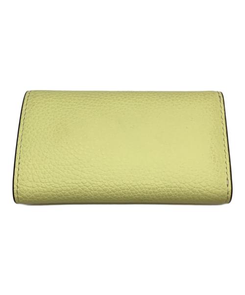 TORY BURCH（トリーバーチ）TORY BURCH (トリーバーチ) ROBINSON PEBBLED KEY CASE イエローの古着・服飾アイテム