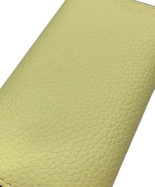 TORY BURCH（トリーバーチ）TORY BURCH (トリーバーチ) ROBINSON PEBBLED KEY CASE イエローの古着・服飾アイテム