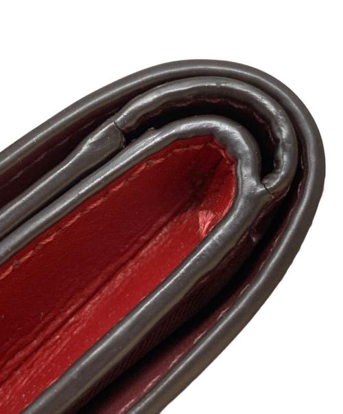 COACH（コーチ）COACH (コーチ) シグネチャー 2つ折り財布 レッドの古着・服飾アイテム