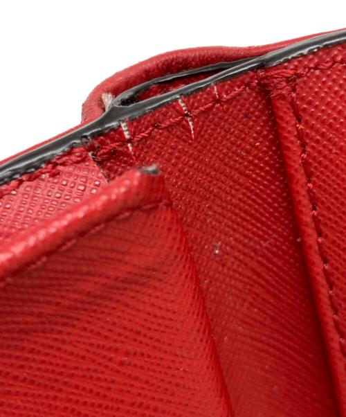 MICHAEL KORS（マイケル・コース）MICHAEL KORS (マイケル・コース) 2つ折り財布 レッドの古着・服飾アイテム