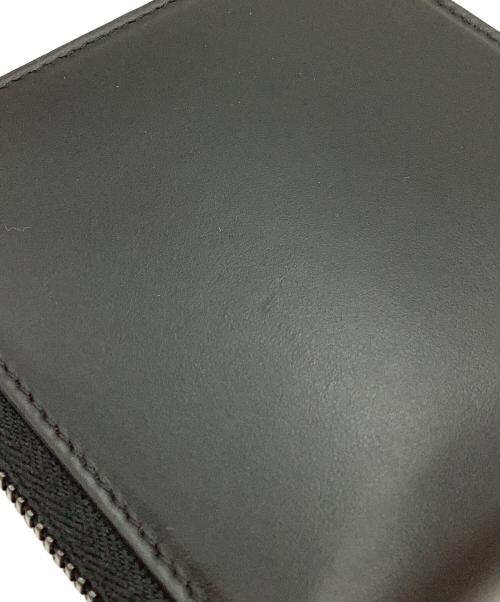 Christian Louboutin（クリスチャン・ルブタン）Christian Louboutin (クリスチャン・ルブタン) 2つ折り財布 ブラックの古着・服飾アイテム