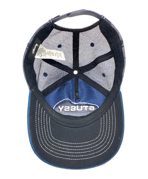 stussy（ステューシー）stussy (ステューシー) CUT OUT LEATHER TRUCKER CAP ネイビーの古着・服飾アイテム