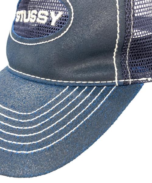 stussy（ステューシー）stussy (ステューシー) CUT OUT LEATHER TRUCKER CAP ネイビーの古着・服飾アイテム