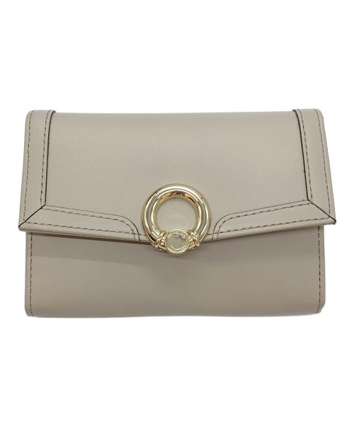 Samantha Thavasa（サマンサタバサ）Samantha Thavasa (サマンサタバサ) サークル金具フラグメントケース ベージュの古着・服飾アイテム