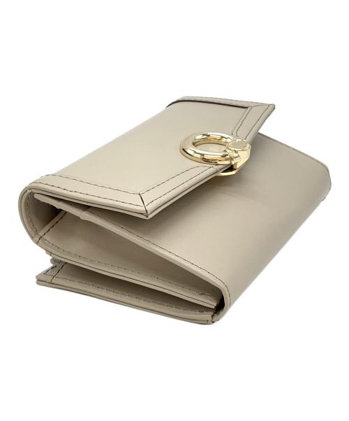 Samantha Thavasa（サマンサタバサ）Samantha Thavasa (サマンサタバサ) サークル金具フラグメントケース ベージュの古着・服飾アイテム