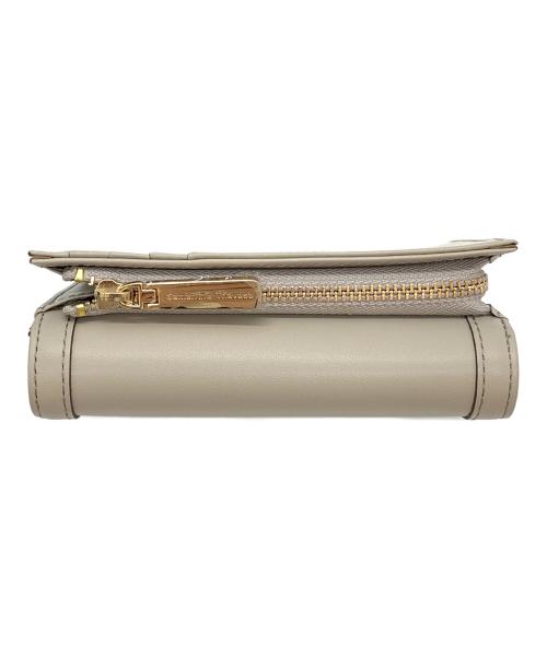 Samantha Thavasa（サマンサタバサ）Samantha Thavasa (サマンサタバサ) サークル金具フラグメントケース ベージュの古着・服飾アイテム