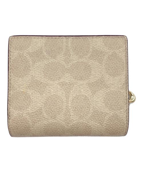 COACH（コーチ）COACH (コーチ) シグネチャー 2つ折り財布 ブラウンの古着・服飾アイテム