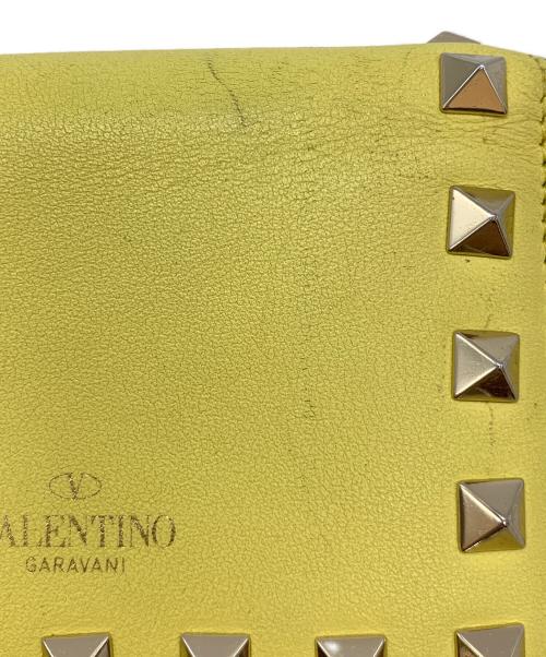 VALENTINO GARAVANI（ヴァレンティノ・ガラヴァーニ）VALENTINO GARAVANI (ヴァレンティノ・ガラヴァーニ) 2つ折り財布 イエローの古着・服飾アイテム