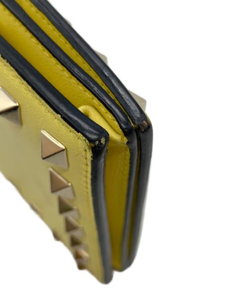 VALENTINO GARAVANI（ヴァレンティノ・ガラヴァーニ）VALENTINO GARAVANI (ヴァレンティノ・ガラヴァーニ) 2つ折り財布 イエローの古着・服飾アイテム