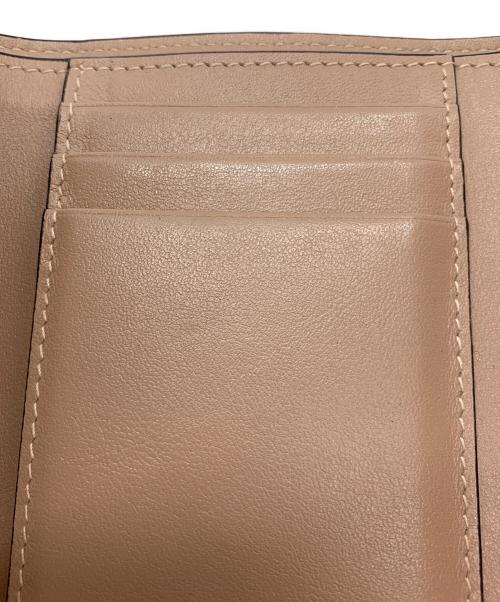 JIMMY CHOO（ジミーチュウ）JIMMY CHOO (ジミーチュウ) 3つ折り財布 レッドの古着・服飾アイテム