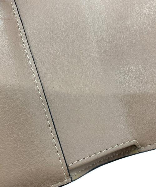 JIMMY CHOO（ジミーチュウ）JIMMY CHOO (ジミーチュウ) 3つ折り財布 レッドの古着・服飾アイテム