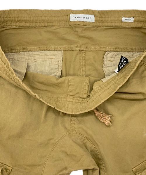 Calvin Klein Jeans（カルバンクラインジーンズ）Calvin Klein Jeans (カルバンクラインジーンズ) カーゴパンツ ブラウン サイズ:86cm(W34)の古着・服飾アイテム