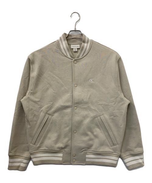 Calvin Klein Jeans（カルバンクラインジーンズ）Calvin Klein Jeans (カルバンクラインジーンズ) バーシティボンバージャケット ベージュ サイズ:Sの古着・服飾アイテム