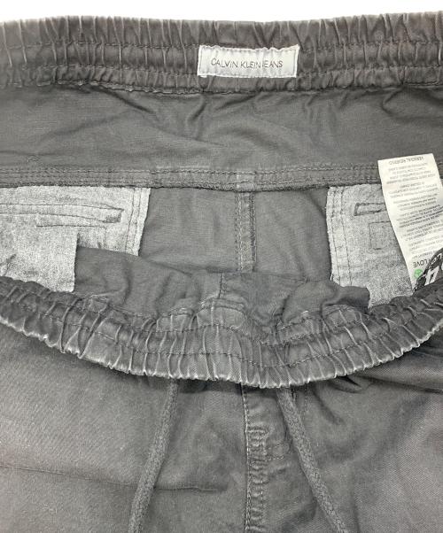 Calvin Klein Jeans（カルバンクラインジーンズ）Calvin Klein Jeans (カルバンクラインジーンズ) カーゴパンツ ブラック サイズ:86cm(W34)の古着・服飾アイテム