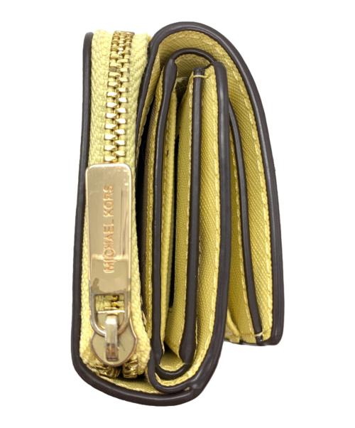 MICHAEL KORS（マイケルコース）MICHAEL KORS (マイケルコース) 3つ折り財布 イエローの古着・服飾アイテム