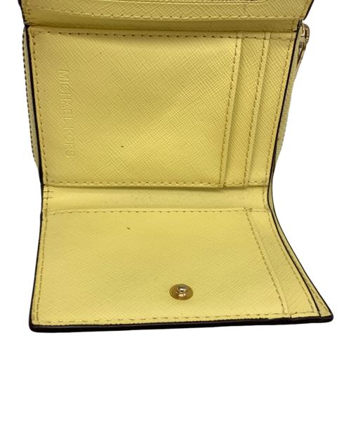 MICHAEL KORS（マイケルコース）MICHAEL KORS (マイケルコース) 3つ折り財布 イエローの古着・服飾アイテム
