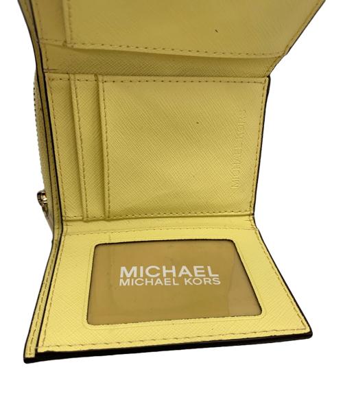 MICHAEL KORS（マイケルコース）MICHAEL KORS (マイケルコース) 3つ折り財布 イエローの古着・服飾アイテム